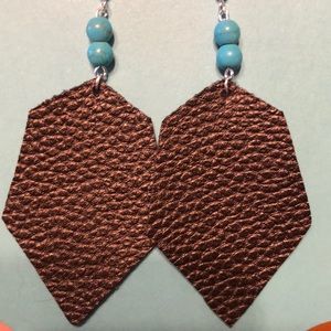 Leather earrings with beaded accents